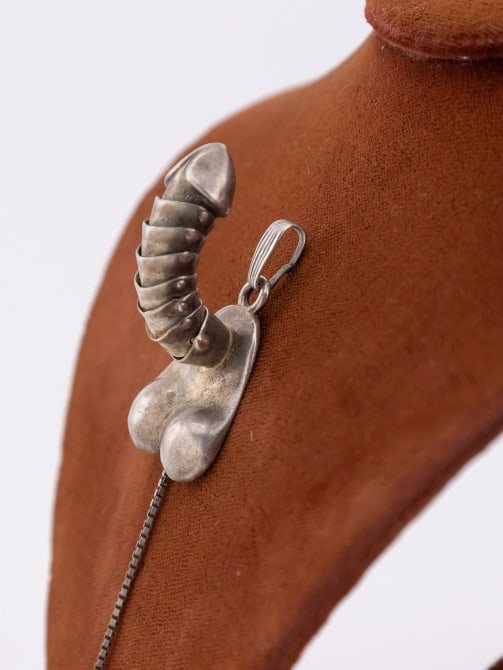 Sterling Silver Articulated Phallic Erotic Pendant: Vintage Sterling Silver Articulated Phallic Erotic Necklace Pendant. Measures 2 inches in length not including the pull chain.