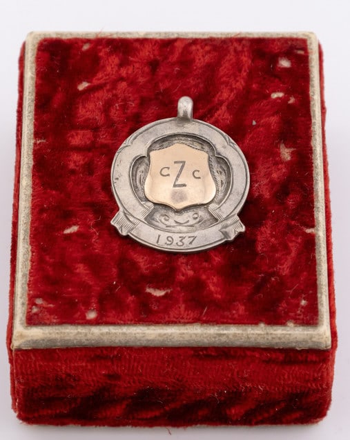 Antique C1937 English Gold Sterling Shield Pendant: Antique C1937 English Gold Sterling Shield Pendant. Sterling silver, full English hallmarks on the back with gold overlay at center in shield design. Back is inscribed 100 MLS 7 HRS R Southall. Measur