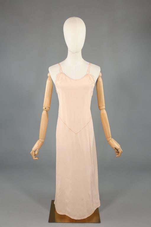 Vintage 1930s Pink Silk Deco Slip Dress Night Gown: Vintage 1930s Pink Silk Deco Slip Dress Night Gown having Deco seaming through front & low back closing with single hook at center back. Bias cut with stretch. Light wear as shown. Measuring 32 inch b
