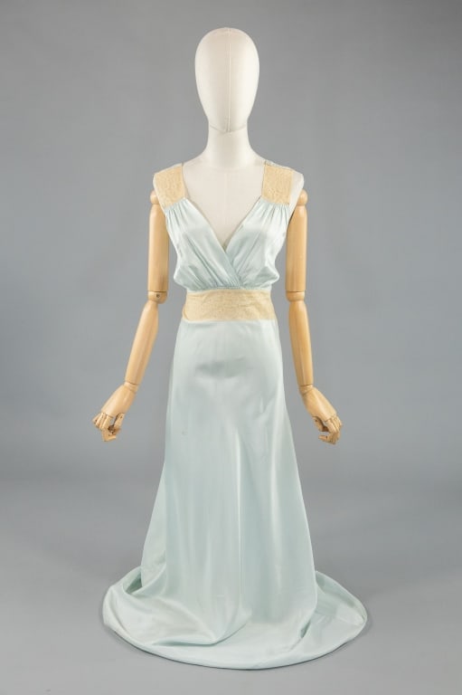 Vintage 1940s Blue Rayon Lace Slip Dress: Vintage 1940s Blue Rayon Lace Slip Dress Night Gown having lace details at shoulder straps and waist with ruched bust. No closures, bias cut with give slides over head. Spots throughout as shown. Labe