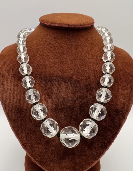 Antique Art Deco Faceted Rock Crystal Necklace: Antique Art Deco Faceted Rock Crystal Necklace. Flapper style. Faceted and graduated size rock crystal beads with basalt / onyx glass spacers. Gold filled, hallmarked. Measures 23 inches in length.