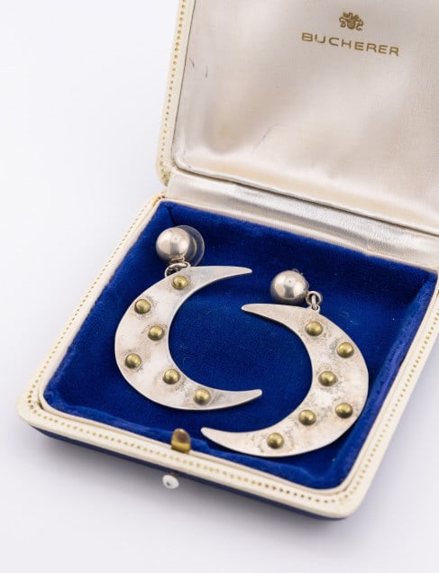 Pair Crescent Moon Sterling Silver Pendant Earring: Pair of Vintage Crescent Moon Sterling Silver Pendant Earrings. With gilt stud detail. Hallmarked on back. Each measures approximately 2.5 inches in length.