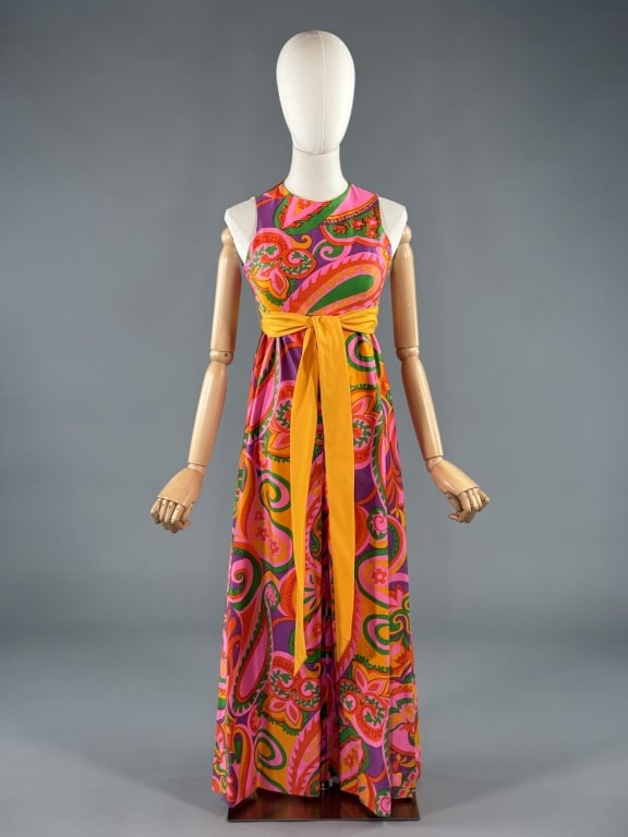 Vintage 1960s Psychedelic Print Jumpsuit One Piece: Vintage 1960s Psychedelic Print Jumpsuit One Piece having sleeveless armholes, belt at waist, with wide legs and center back zip closure. Measuring 32 inch bust, 28 inch waist, 52 inch full length.