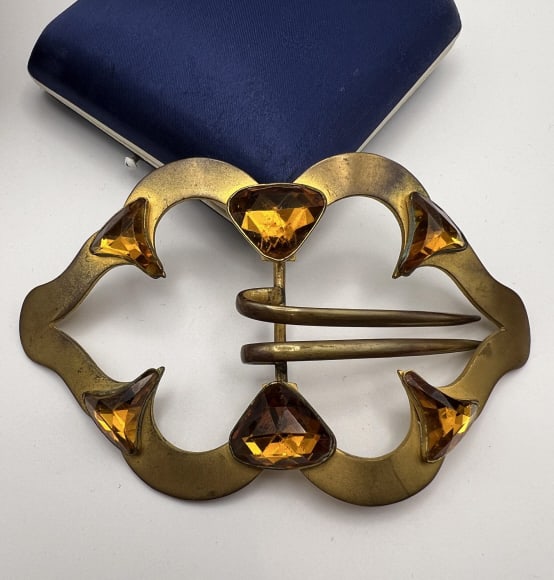 Antique 1900-1910 Ormolu & Citrine Crystal Buckle: Antique 1900-1910 Ormolu & Citrine Crystal Buckle. Large scale belt buckle with loops on back so it could also be sewn into a garment. Set with citrine tone faceted crystals. Hallmarked on the back. M