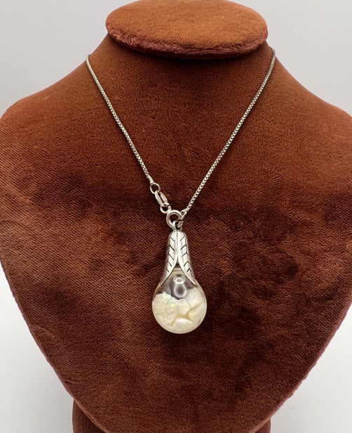 Floating Opal Pendant on Italian Sterling Chain: Floating Opal Necklace Pendant on Italian Sterling Silver Box Chain Necklace Chain. Chain is hallmarked and stamped MADE IN ITALY. Chain measures just over 17 inches in length, opal pendant is approxi