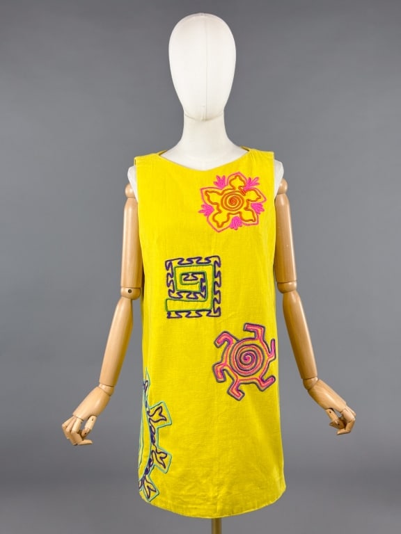 Vintage 1960s Embroidered A-Line Mod Dress: Vintage 1960s Embroidered A-Line Mod Dress having abstract embroidery through front with back zip closure. Labeled Franklin Simon - measuring 36 inch bust, 33 inches long.