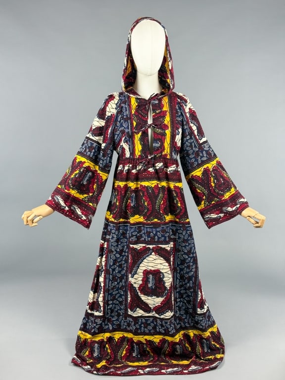 Vintage 1970s Block Print Cotton Hooded Dress: Vintage 1970s Block Print Cotton Hooded Dress having tie front closure with hood at neck and ruching through waist. Labeled Young Innocent - measuring 36 inch bust, 32 inch waist, 55 inches long, 20 i