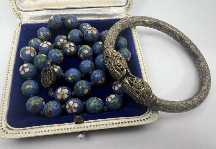 Antique Chinese Enamel Decorated Jewelry Items: Antique Chinese Enamel Decorated Jewelry Items. Champleve style enamel bangle bracelet with double dragon heads and hand knotted beaded necklace strand. Necklace measures approximately 18 inches in le