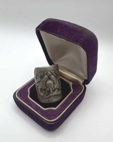 Antique Chinese Export Silver Ring w Relief Plaque: Antique Chinese Export Silver Ring w Central Relief Plaque. Floral motif.