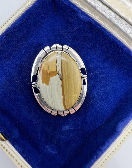 Native American Sterling & Jasper Brooch Pendant: Native American Sterling & Jasper Brooch Pendant. Sterling silver bezel set picture jasper / landscape jasper mounted as a brooch or necklace pendant. Stamped STERLING on the back. Measures 1.5 inches
