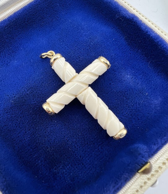 Antique 19th C Victorian Carved Bone Cross: Antique 19th C Victorian Carved Bone Cross.Mid to late Victorian era, carved cow or ox bone carved cross necklace pendant with gold filled or plated mounts. Measures 1.75 inches in length.