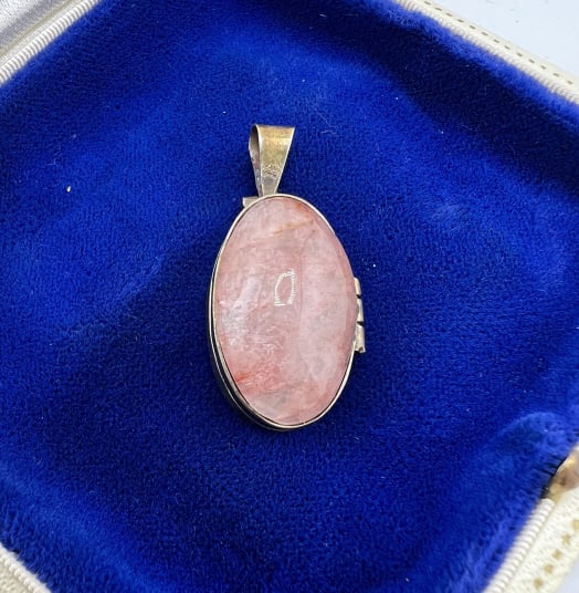 Estate / Vintage Rose Quartz Cabochon Locket: Estate / Vintage Rose Quartz Cabochon Locket Necklace Pendant in Alpaca Silver. Measures 1.5 inches in length.