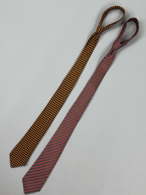 Two Vintage Hermes Paris French Silk Neck Ties: Two Vintage Hermes Paris French Silk Neck Ties. Both marked 100% silk. Longer measuring approximately 58 inches long.