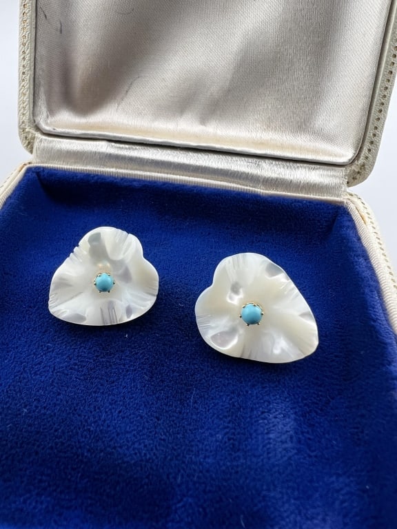 Estate 14kt Yellow Gold Turquoise Flower Earrings: Pair of Estate 14kt Yellow Gold Turquoise Flower Earrings. Pair of hand carved mother of pearl floral motif earrings with turquoise cabochons at center. Hallmarked. Each measures just over .75 of an i