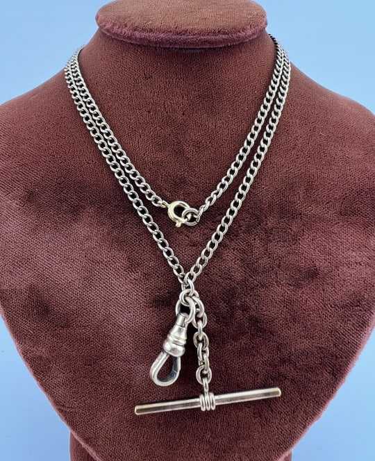 Antique 19th C Watch Chain Necklace w Dog Clip: Antique 19th C Watch Chain Necklace w Dog Clip. Antique yellow gold filled watch chain necklace with curb link chain, dog clip, spring ring (may be later replacement) and T bar. Measures 20 inches in