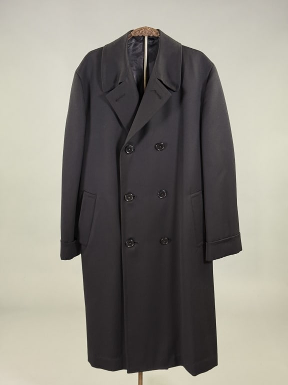 Vintage Oxxford Clothes Barneys NY Wool Pea Coat: Vintage Oxxford Clothes Barneys NY Wool Pea Coat having notched lapel collar with double breasted button front closure and two welt pockets at front, fully lined. Measuring 50 inch chest, 44 inches lo