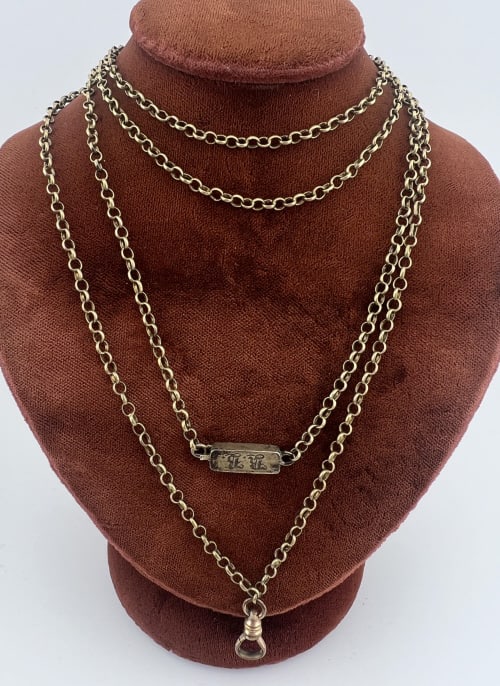 Antique 19th C Gold Filled Watch Chain Necklace: Antique 19th C Gold Filled Watch Chain Necklace. Rolo link watch chain necklace / guard chain with hallmarked and monogrammed clasp as well as dog clip. Chain measures 45 inches in length.