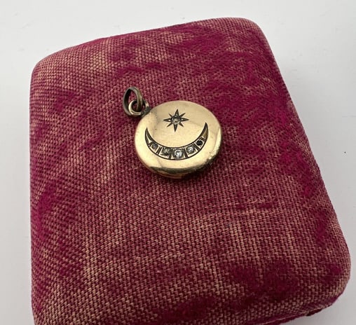 Antique 19th C Gold Filled Crescent Moon Locket: Antique 19th C Gold Filled Crescent Moon & Star Locket Necklace Pendant. Interior with original photo and four leaf clover. Set with paste stones. Measures just over 1 inch in length.
