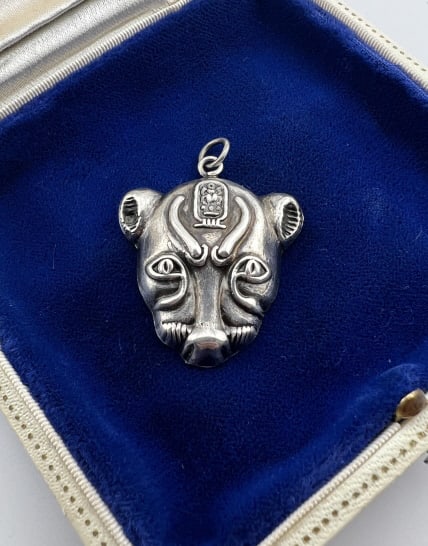 Antique Egyptian Revival Sterling Silver Pendant: Antique Egyptian Revival Sterling Silver Pendant. Egyptian god Sekhmet necklace pendant, acid tests for silver. Measures 1.5 inches in length.