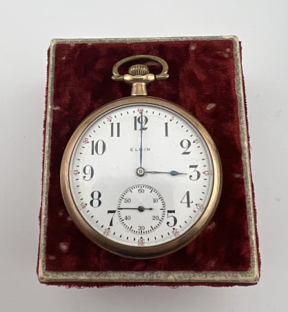 Antique Gold Filled Elgin 15 Jewels Pocket Watch: Antique Gold Filled Elgin 15 Jewels Pocket Watch. Yellow gold filled, white enamel face, inset smaller seconds dial. Measures just under 2.5 inches in length.