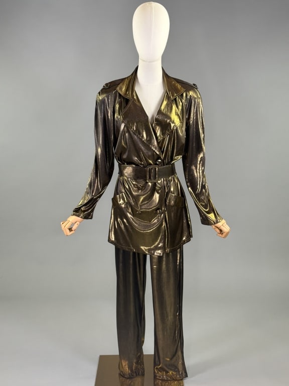 Vintage 1980s Metallic Trench Coat & Pants Set: Vintage 1980s Metallic Trench Coat & Pants Set having trench coat style jacket with notched lapel collar, belt at waist, and double breasted button closure with epaulettes at shoulders and faux pocket