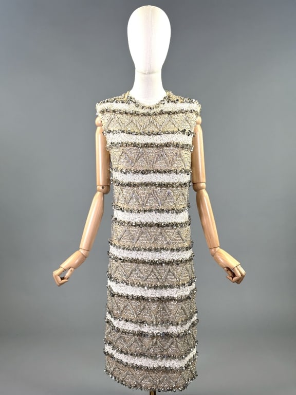 Vintage 1950s Metallic Embellished Knit Dress: Vintage 1950s Metallic Embellished Knit Dress having heavy sequin, bead, and paillette embellishments throughout with center back zip closure, fully lined. . Missing beads and wear throughout as shown