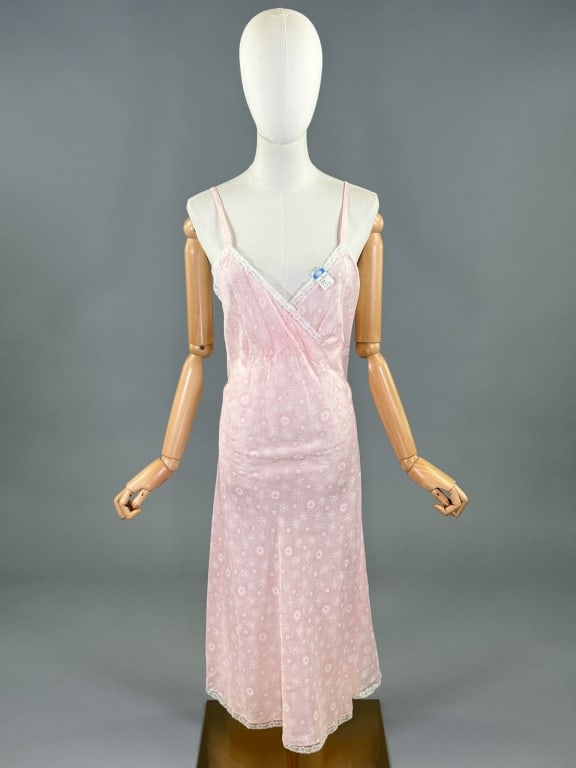 Vintage 1960s Printed Nylon Slip Dress Night Gown: Vintage 1960s Printed Nylon Slip Dress Night Gown having print throughout with lace detail at bust, bias cut with stretch throughout. Labeled IMEC. Measuring 34 - 40 inch bust, 28 - 38 inch waist, 48