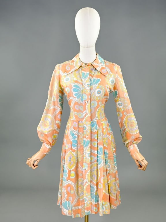 Vintage 1970s Psychedelic Pleated Shirt Dress: Vintage 1970s Psychedelic Pleated Shirt Dress having dog ear collar at neck with button front closure at neck and pleated skirt. Measuring 36 inch bust, 30 inch waist, 38 inches long, 24 inch sleeve l