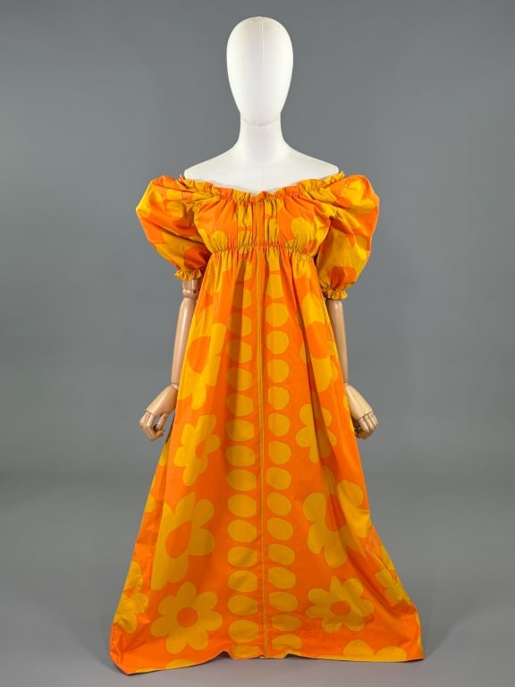 Vintage 1960s Cotton Mod Floral Print Maxi Dress: Vintage 1960s Cotton Mod Floral Print Maxi Dress having elastic empire waist and floral print throughout. Measuring 32 - 44 inch bust, 10 - 46 inch waist, 50 inches long, 14 inch sleeve length.