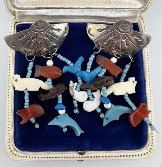 Native American Style Sterling Fetish Earrings: Pair of Native American Style Sterling Silver & Fetish Charm Earrings. Set with turquoise, bone and jasper carved animal beads. Hallmarked. Each measures 3 inches in length.