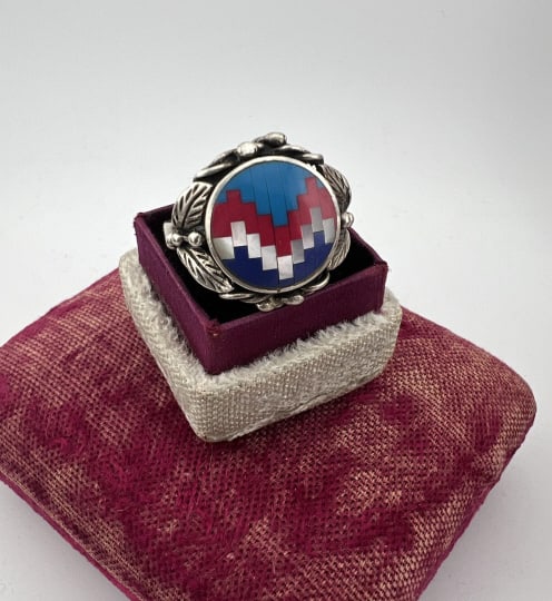 Vintage Native American Sterling Zuni Mosaic Ring: Vintage Native American Sterling Zuni Mosaic Ring. Zuni micro mosaic ring with turquoise, coral and mother of pearl pieces in beautiful sterling silver setting with leaves, berry and vine motif. Hallm