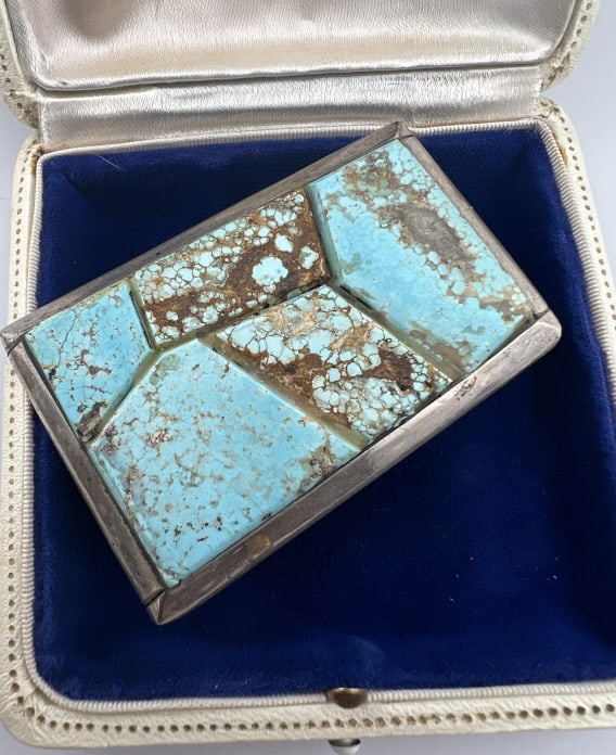 NA NA Ping Michael Garcia Sterling Turquoise Belt: Vintage Native American NA NA Ping aka Michael Garcia Sterling Silver & Turquoise Belt Buckle. Signed and hallmarked on the back. Set with five carved turquoise plaques. Measures 2.5 x 1.75 inches.