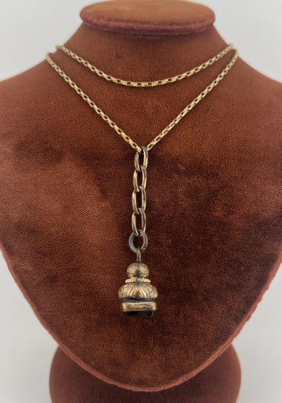 Antique 19th C Intaglio on Gold Filled Necklace: Antique 19th C Intaglio on Gold Filled Necklace. Gold filled necklace chain with a 19th Century Victorian era carved black onyx intaglio pendant. Chain measures 19 inches in length, pendant on drop is