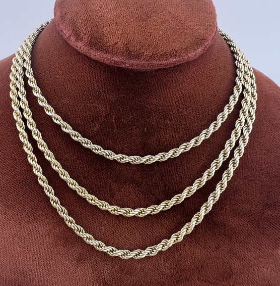 Italian Gold Over Sterling Rope Necklace Chain: Italian Gold Over Sterling Silver Rope Necklace Chain. Rope twist motif necklace chain. Hallmarked ITALY and 925 on the clasp. Measures 30 inches in length.