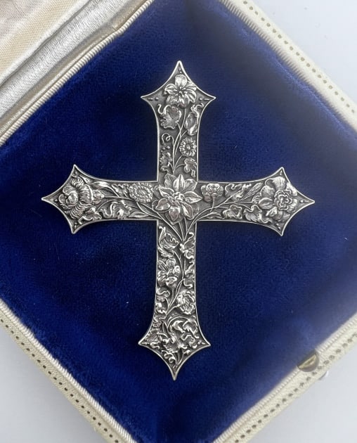 Ornate Sterling Floral Cross Necklace Pendant: Ornate Victorian Style Sterling Silver Floral Motif Cross Necklace Pendant. Hallmarked on the back. In the style of Baltimore silver / Kirk sterling but hallmarked NGA. Measures 2.75 inches in length.