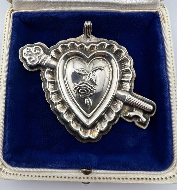 Reed & Barton Sterling Silver Heart & Key Pendant: Reed & Barton Sterling Silver Heart & Key Pendant. Vintage heart with rose and skeleton key necklace pendant, hallmarked and signed on the back. Measures approximately 2.5 x 3 inches in size.