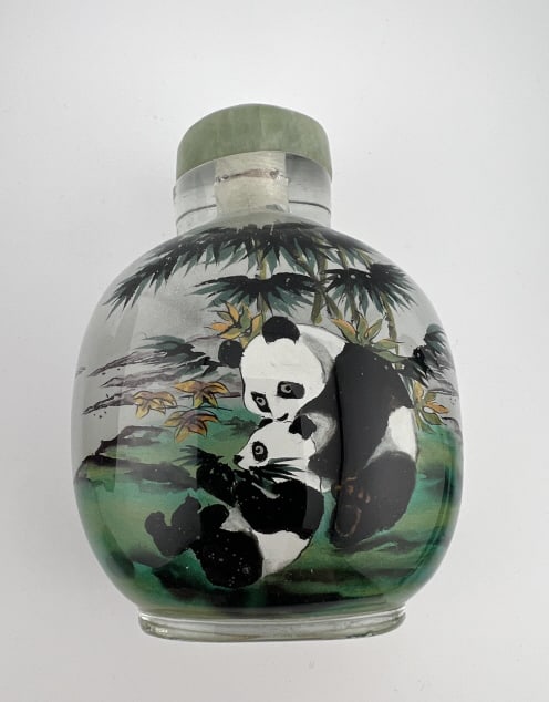 Chinese Reverse Painted Glass Bottle w Stopper: Chinese Reverse Painted Glass Bottle w Stopper. Scenes of mother and child panda bears on front and back. Measures just over 3.5 inches in length.
