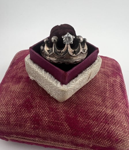 Sterling Silver Figural Crown / Tiara Motif Ring: Sterling Silver Figural Crown / Tiara Motif Ring. Prong set with CZ or synthetic diamond. Hallmarked. Ring size 11 approximately