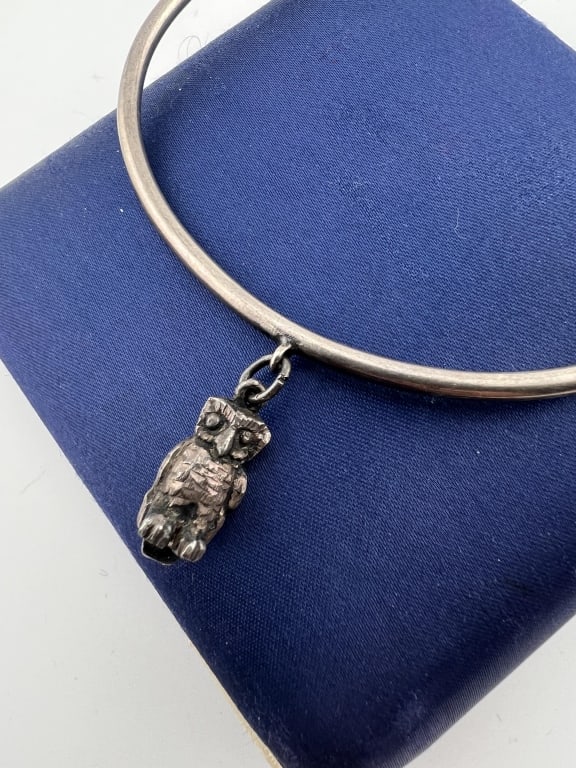 Antique Sterling Silver Bangle Owl Charm Bracelet: Antique Sterling Silver Bangle Bracelet w Owl Charm. Bracelet measures just over 2.75 inches across the interior opening. Owl measures .75 of an inch.