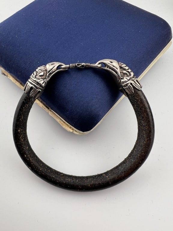 Sterling Silver Leather Eagle Head Motif Bracelet: Sterling Silver & Leather Double Eagle Head Motif Bracelet w Ornate Clasp. Measures just over 2 inches across the interior opening.