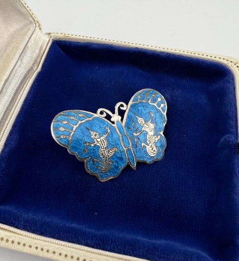 Vintage Sterling & Blue Enamel Butterfly Brooch: Vintage Sterling Silver & Blue Enamel Figural Butterfly Brooch Pin. Hallmarked SIAM STERLING on the back. Measures 1.75 inches in width.