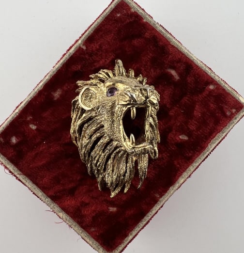 Gold Over Sterling Les Bernard Lion Head Brooch: Gold Over Sterling Les Bernard Lion Head Brooch. Yellow gold plated over sterling silver figural roaring lion head brooch with ruby eyes. Signed and hallmarked on the back. Eyes test as ruby on the Pr