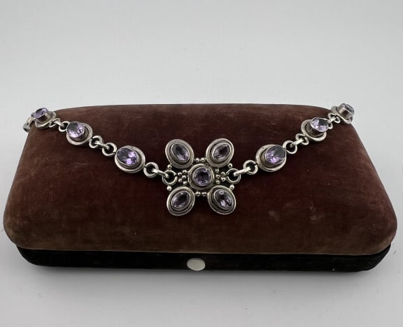 Sterling Silver & Bezel Set Amethyst Bracelet: Sterling Silver & Bezel Set Amethyst Bracelet. Hallmarked. Measures 7.5 inches in length.