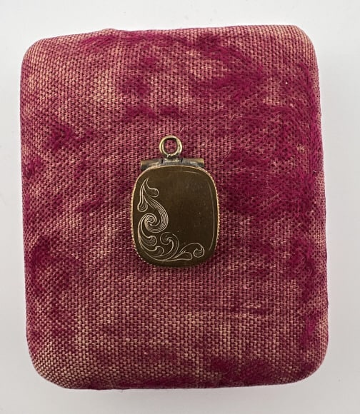 Antique 19th C Victorian Gold Filled Locket Fob: Antique 19th C Victorian Gold Filled Locket Necklace Pendant or Fob. With scrollwork design on the front. Measures 1 inch in length.