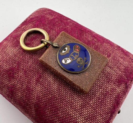 Antique 19th C Goldstone Skull Motif Pendant Fob: Antique 19th C Goldstone Skull Motif Pendant Fob. For the Odd Fellows fraternal organization. Gold filled, enamel and goldstone. Measures just under 2 inches in length.