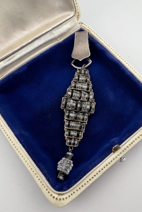 Antique Art Deco Era Rock Crystal Sterling Pendant: Antique Art Deco Era Rock Crystal & Sterling Silver Ribbon Fob Pendant. Measures just under 4 inches in length. Featuring faceted rock crystal beads and onyx glass beads.
