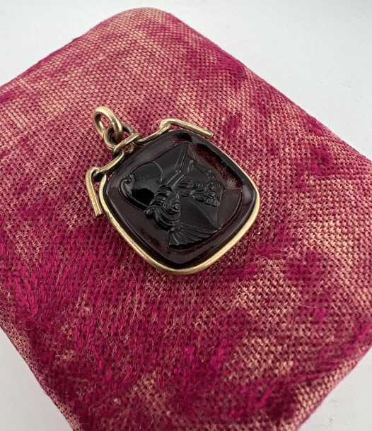 Antique 19th C Gold Filled Carnelian Cameo Pendant: Antique 19th C Gold Filled Carnelian Cameo Pendant. Gold filled frame with Greco Roman style soldier cameo in carnelian or colored glass. Measures just under 1.25 inches in length with the bail.
