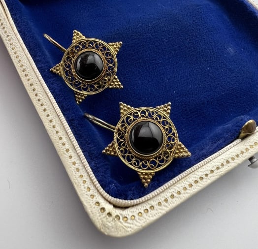 Etruscan Revival Gold Over Silver Onyx Earrings: Pair of Vintage Gold Over Silver Starburst Onyx Earrings. Having filigree and bead work in the Etruscan Revival style. Each measures just over 1 inch in length.