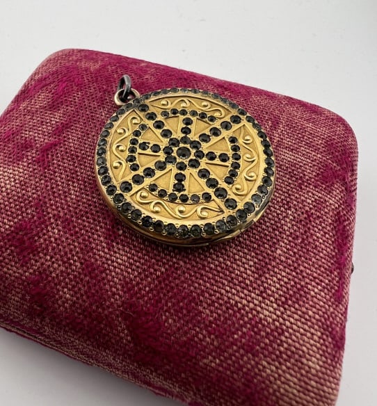 Antique Victorian Gold Filled Paste Locket Pendant: Antique Victorian Gold Filled Paste Locket Pendant. Front is set with an ornate pattern of paste stones. Back is inscribed Gertrude. Measures just over 1.5 inches in length.