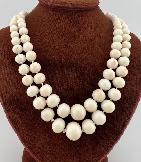 Antique Double Strand Natural Coral Bead Necklace: Antique Double Strand Natural Coral Bead Necklace. With sterling silver clasp, hallmarked. Beads are natural / undyed and show slight color variation. Longer strand measures 17 inches in length.